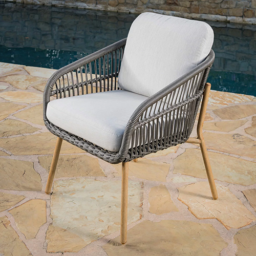 Charme 3-piece outdoor dining set with wicker chairs and round stone table