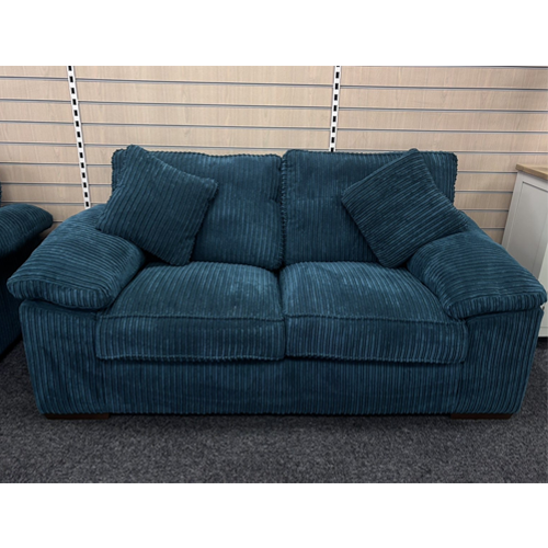 Buoyant Dexter 2-Seater Sofa with deep cushions, padded arms, and coordinating scatter cushion in modern living room.